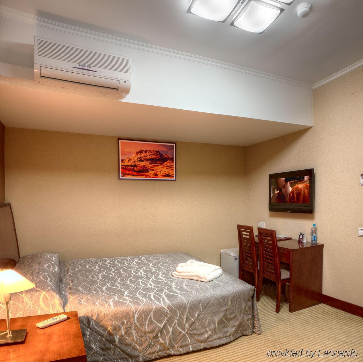 Voyage Hotel Almaty Quarto foto